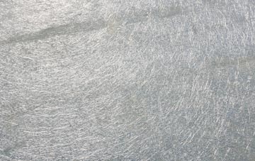 Catcomb laminate fibreglass or shingles?